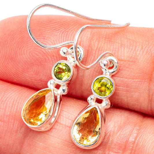 Sterling silver drop earrings with round peridot green and citrine orange teardrops