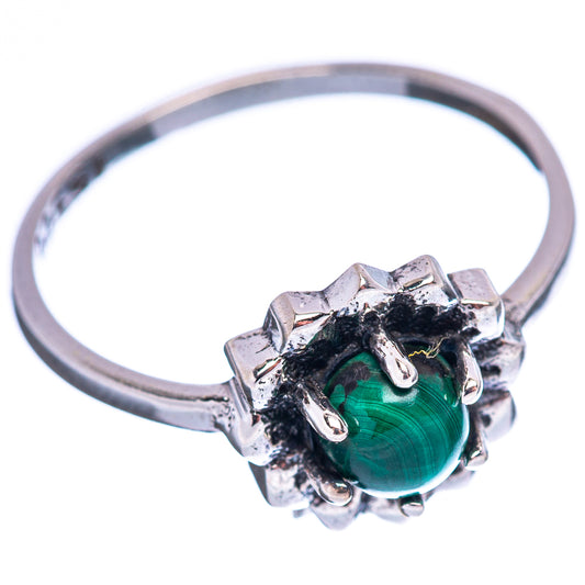 Sterling silver ring with green oval malachite cabochon in ornate bezel