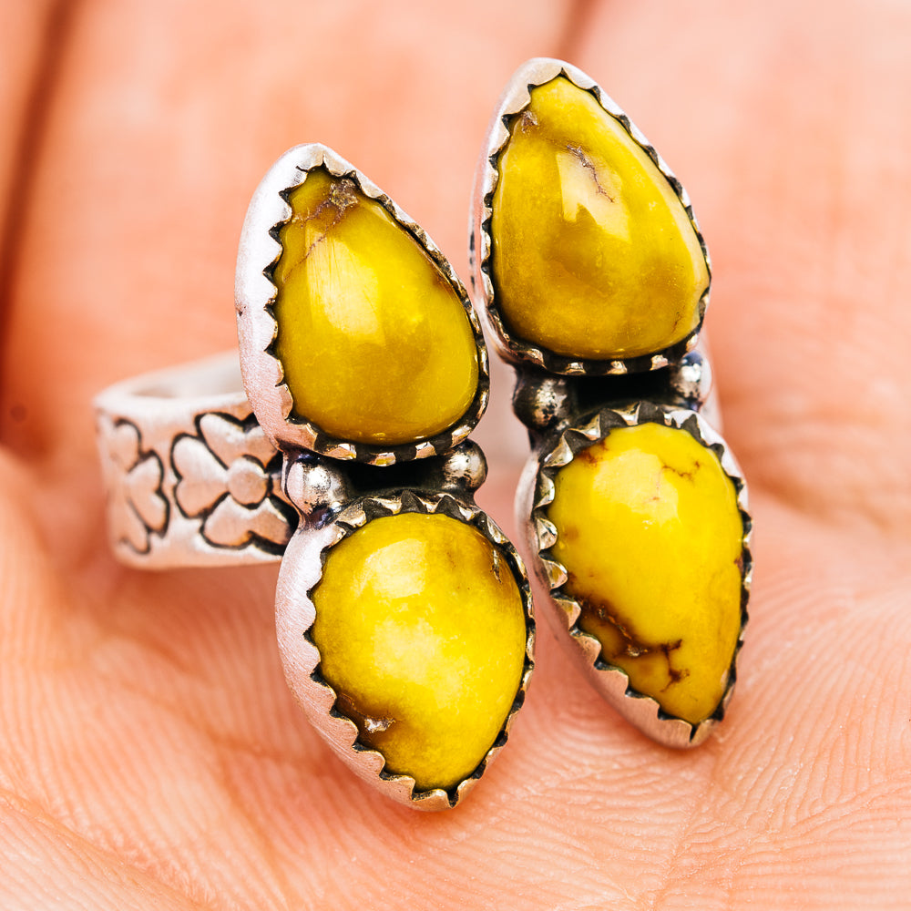 Adjustable .925 sterling silver ring with yellow teardrop stones and ornate setting