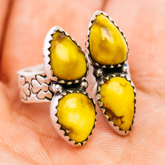 Adjustable .925 sterling silver ring with yellow teardrop stones and ornate setting