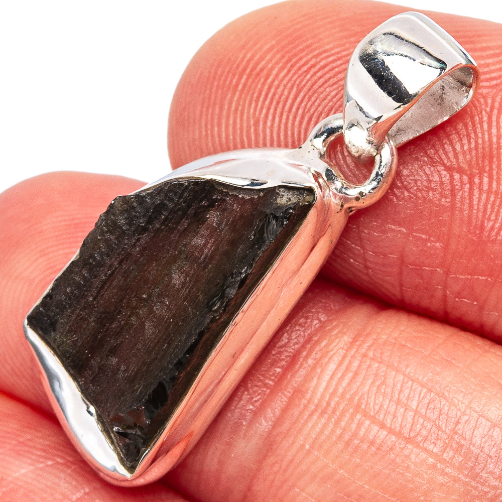 Sterling silver pendant with dark rough Moldavite stone in prong setting