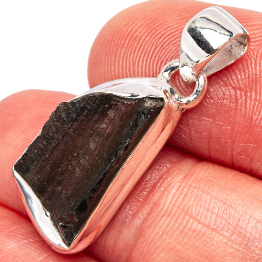 Sterling silver pendant with dark rough Moldavite stone in prong setting
