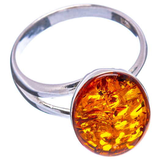 Oval amber cabochon ring with polished 925 sterling silver band and bezel