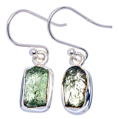 Sterling silver fishhook earrings with raw green moldavite drop stones, oval bezels