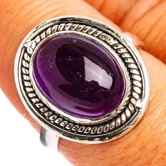 Amethyst cabochon .925 sterling silver ring with ornate rope bezel and oval purple stone