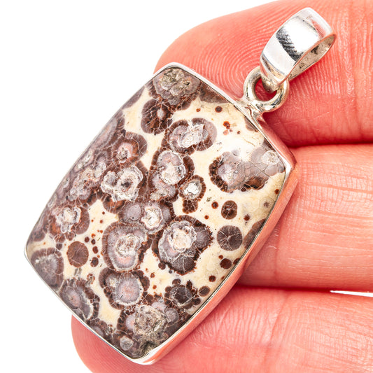 Jasper stone pendant with rectangular silver frame and loop bail, marbled dark circles