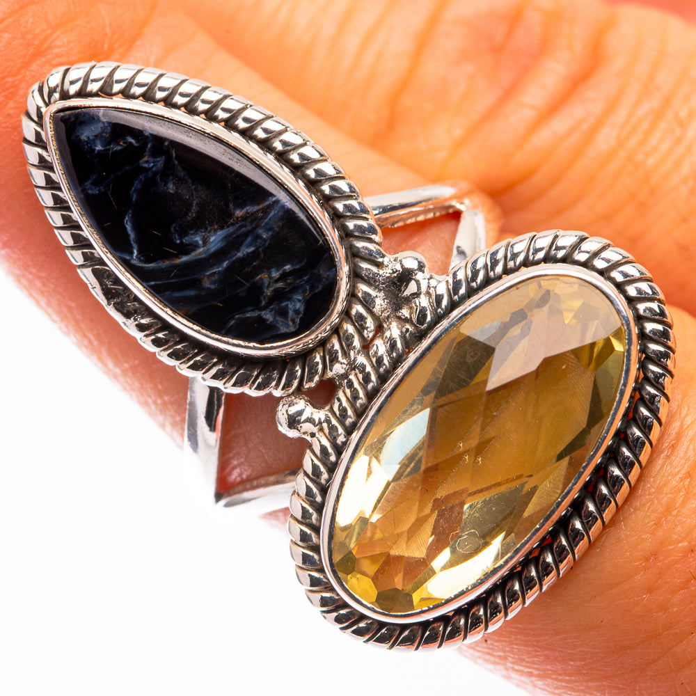 Silver oval gemstone ring with dark blue pietersite and yellow lemon quartz, rope bezel