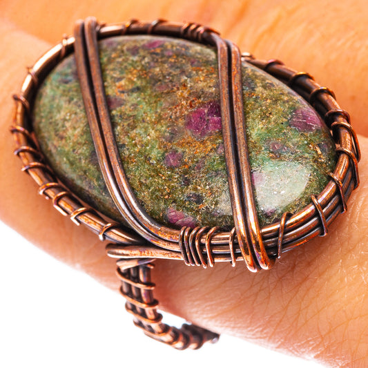 Oxidized copper wire ring with oval green fuchsite cabochon, purple speckles