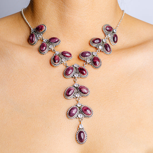 Sterling silver necklace with purple oval stones and teardrop drops