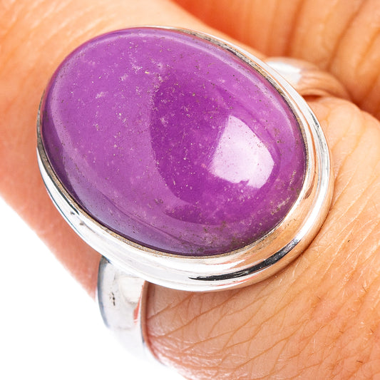 Sterling silver ring with purple gemstone cabochon, oval setting, size 8.