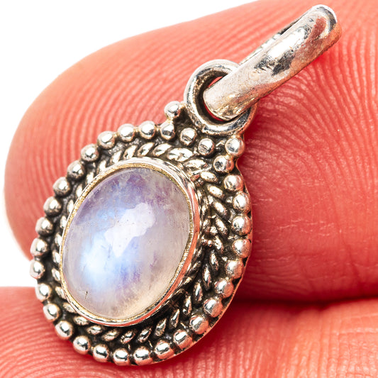 Oval rainbow moonstone pendant, .925 sterling silver with beaded border and bail