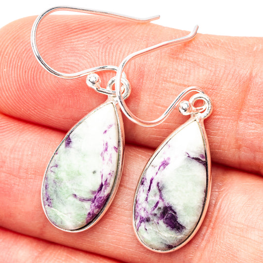 Sterling silver teardrop earrings with purple and white gemstone in drop setting