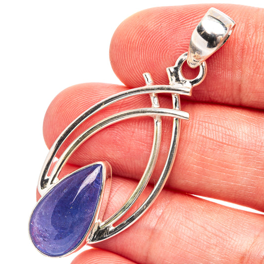 Tanzanite pendant in sterling silver with pear-shaped blue gemstone, open oval frame