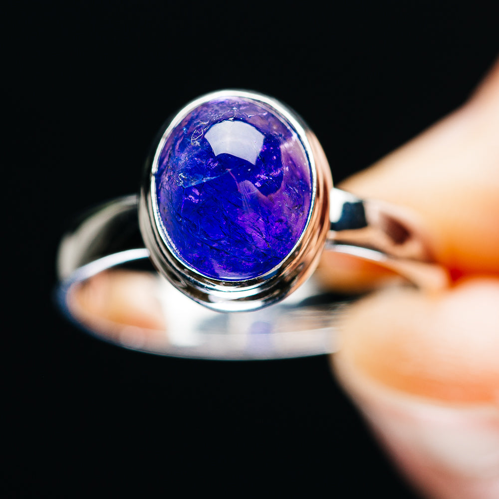 Oval purple-blue gemstone ring, polished sterling silver bezel setting
