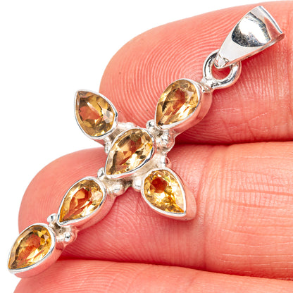 Citrine cross pendant in 925 sterling silver with five faceted yellow stones