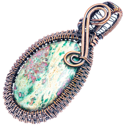 Oxidized copper wire-wrapped teardrop pendant with green-blue speckled stone, round loop