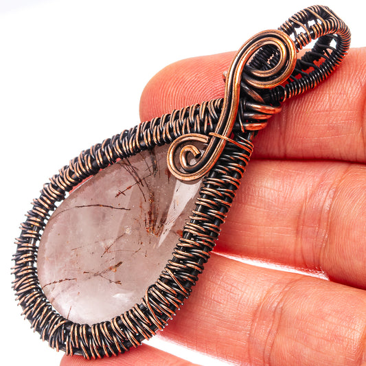 Oxidized copper wire-wrapped rutilated quartz teardrop pendant with bail loop