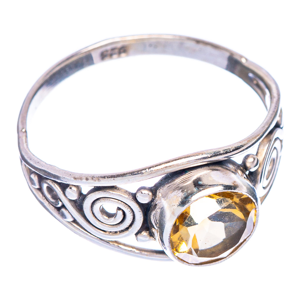 Sterling silver dainty ring with oval faceted yellow citrine and spiral side designs