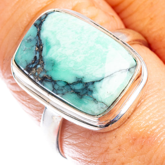 Sterling silver ring with rectangular turquoise variscite cabochon and black webbing
