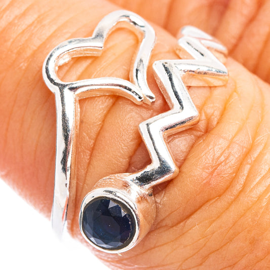 Adjustable sterling silver heart ring with round blue gemstone