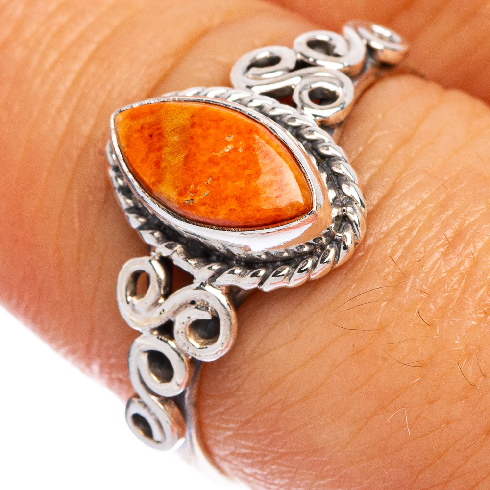 Orange coral teardrop set in ornate 925 sterling silver band, size 8