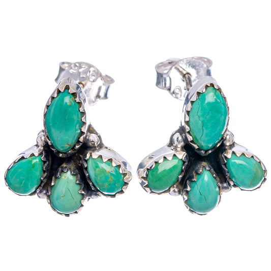 Sterling silver cluster earrings with turquoise teardrop stones and small clear accents