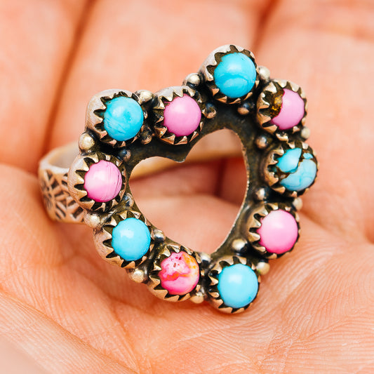 Southwestern heart ring with blue turquoise, pink stones, and scalloped silver bezel