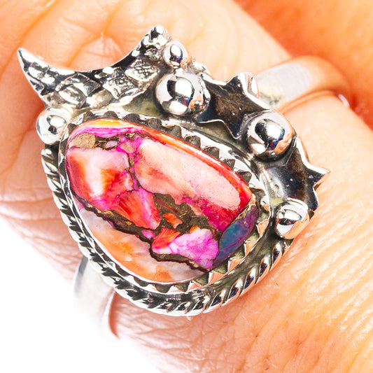 Sterling silver ring with pink teardrop inlay and ornate bezel setting
