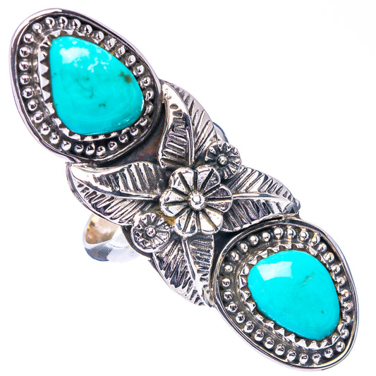 Sterling silver turquoise ring with oval turquoise cabochons, leaf-and-flower details