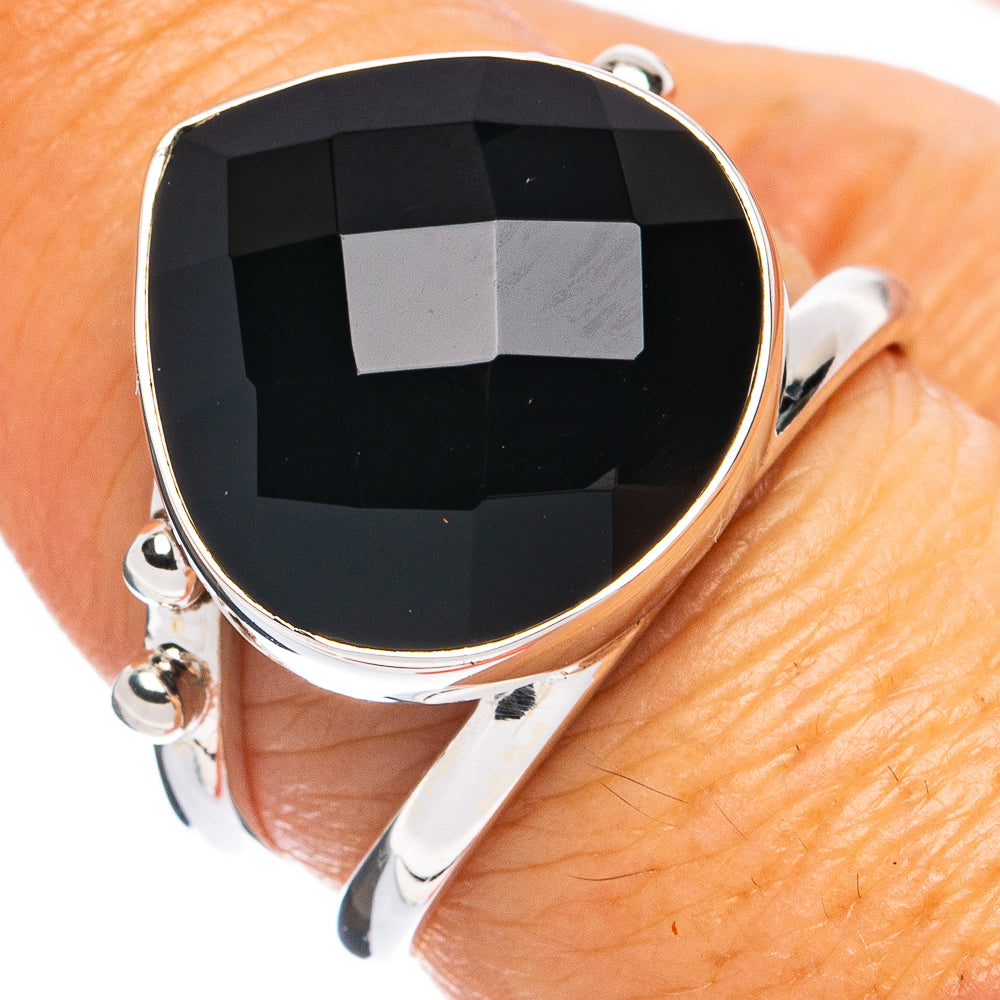 Sterling silver ring with faceted black onyx-style oval gemstone
