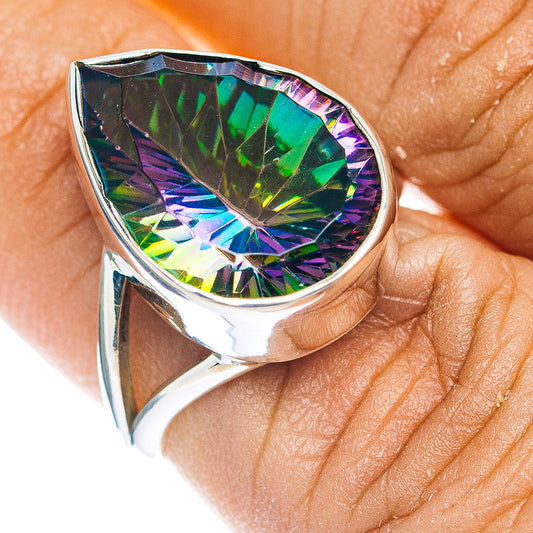 Sterling silver ring with teardrop mystic topaz faceted gemstone, rainbow colors.