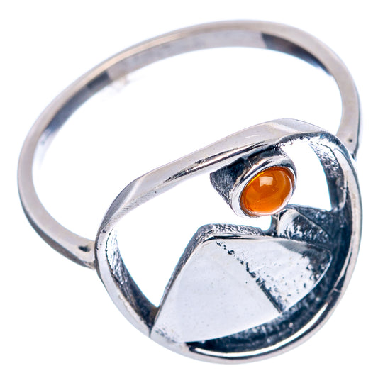 Dainty sterling silver ring with orange carnelian cabochon and mountain-shaped centerpiece
