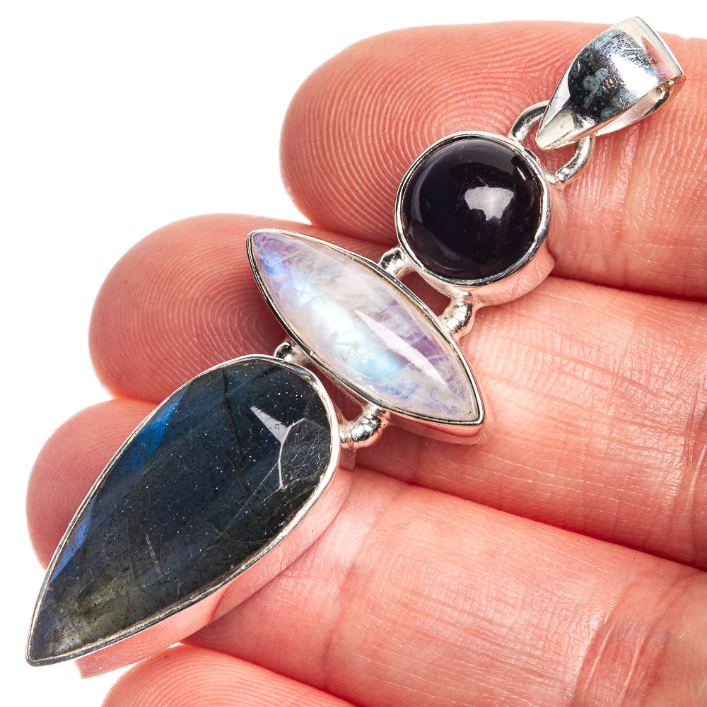 925 silver gemstone pendant with black, iridescent white, and blue stones