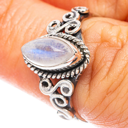 Sterling silver moonstone dainty ring with oval rainbow stone and ornate filigree setting