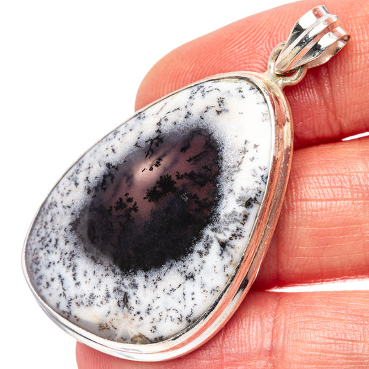 Teardrop dendritic opal pendant in polished .925 sterling silver, close-up view