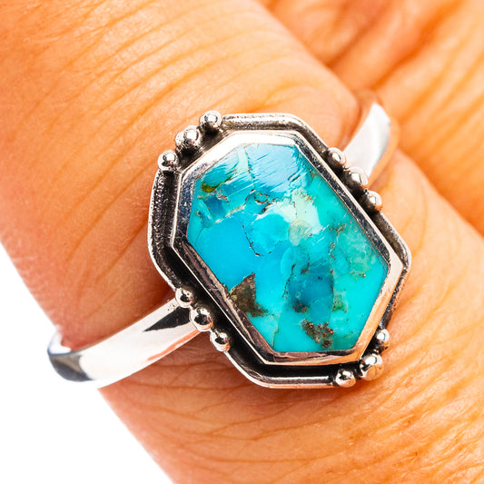Sterling silver ring with turquoise hexagonal stone and raised bezel detail
