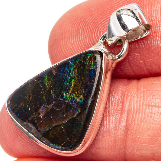 Sterling silver ammolite pendant close-up, iridescent green-blue oval teardrop on bail