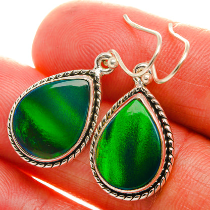Sterling silver teardrop opal earrings with green glass, rope border and hook backs