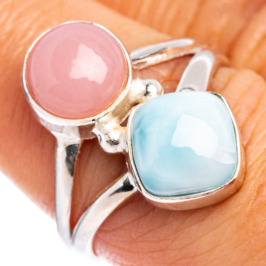 Sterling silver ring with round pink opal and oval blue larimar cabochon bezel