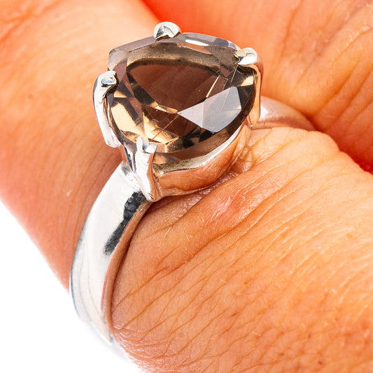 Sterling silver ring, faceted smoky quartz close-up on finger, size 7