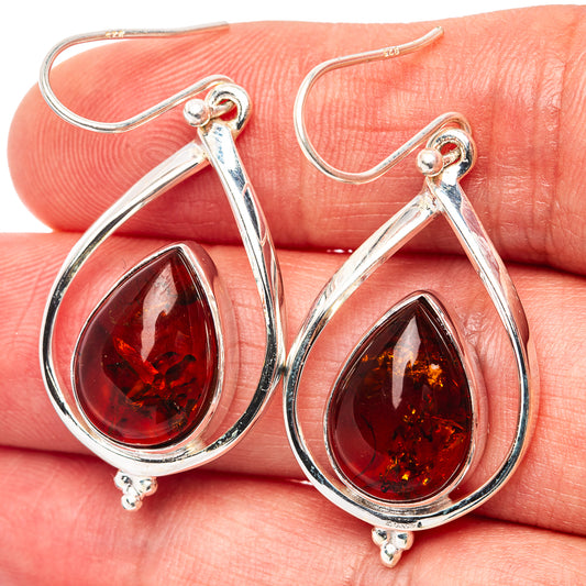 Sterling silver amber teardrop dangle earrings with red marbled stone, hook backs