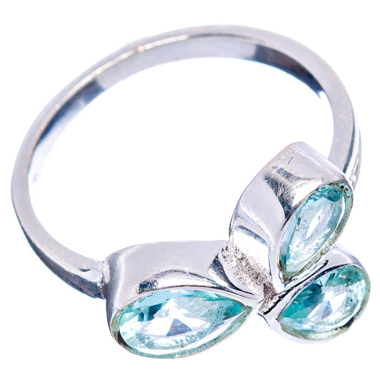 Sterling silver ring with three light blue stones and textured split-prong setting