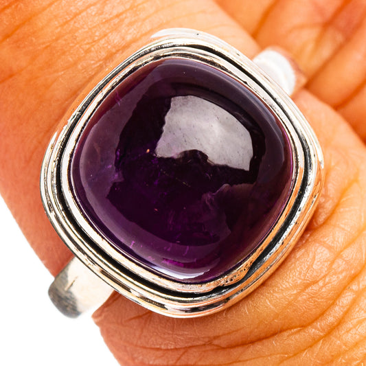 Amethyst ring in .925 sterling silver, oval purple gemstone bezel; close-up top view