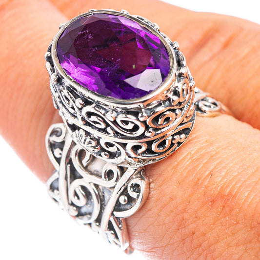 Oval purple amethyst gemstone ring with ornate .925 sterling silver filigree setting