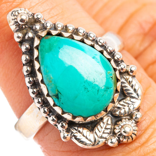 Oval turquoise cabochon ring in .925 sterling silver with detailed beaded border