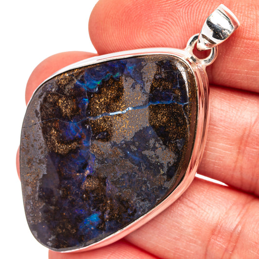 Boulder opal pendant, teardrop bezel set in .925 sterling silver, blue flashes