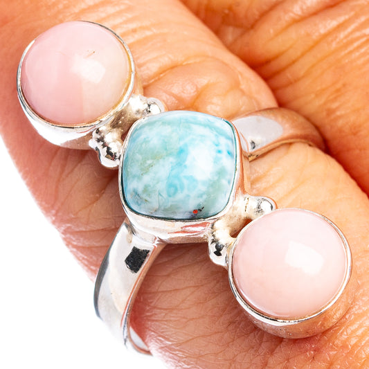 Sterling silver ring with two oval pink opal stones and one oval blue larimar center