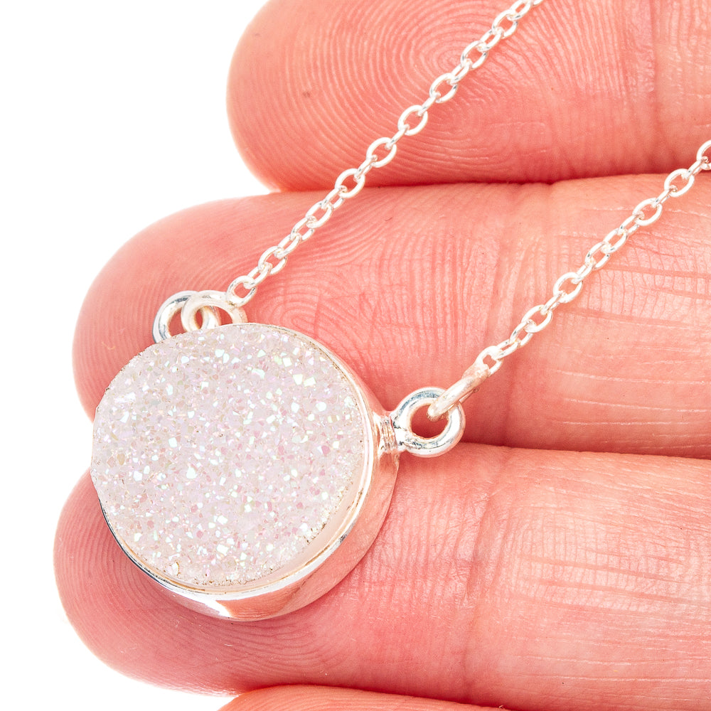 Sterling silver druzy pendant necklace with oval shimmering stone and small red accent bail
