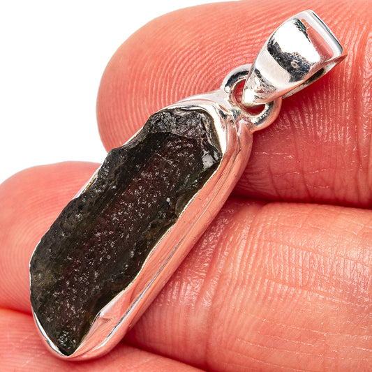 Sterling silver bezel-set rough dark moldavite pendant with loop bail