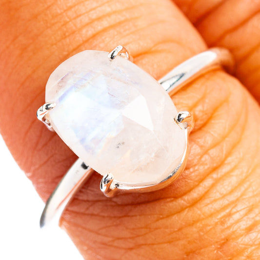 Faceted rainbow moonstone ring, oval sterling silver setting with four prongs